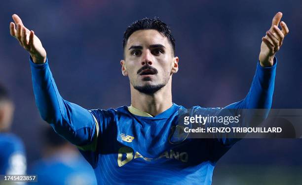 Porto's Canadian midfielder Stephen Eustaquio celebrates scoring his team's second goal during the UEFA Champions League Group H football match...