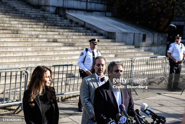 Michael Cohen, former personal lawyer to US President Donald Trump, right, speaks to members of the media outside New York State Supreme Court in New...