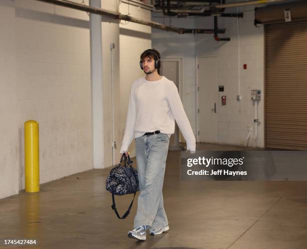 Deni Avdija of the Washington Wizards arrives to the arena before the game against the Indiana Pacers on October 25, 2023 at Gainbridge Fieldhouse in...