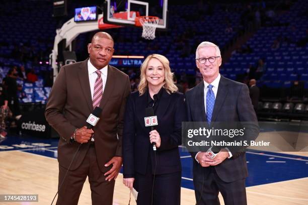 Broadcasters, Doc Rivers, Doris Burke, and Mike Breen pose for a photo before the game between the Boston Celtics and the New York Knicks on October...
