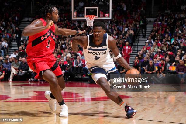 Anthony Edwards of the Minnesota Timberwolves drives to the basket during the game against the Toronto Raptors on October 25, 2023 at the Scotiabank...