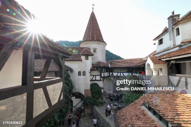 People visit Bran castle, now a visiting attraction for Romanian and Foreign tourists as the Bram Stoker's novel said was the living place of...