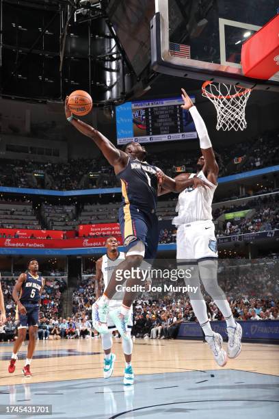 Zion Williamson of the New Orleans Pelicans drives to the basket during the game against the Memphis Grizzlies on October 25, 2023 at FedExForum in...