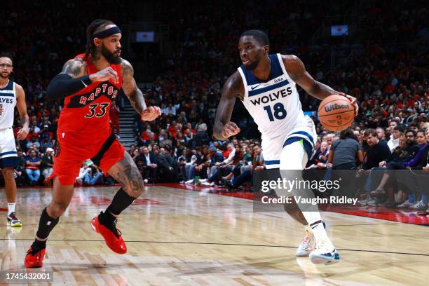 Shake Milton of the Minnesota Timberwolves dribbles the ball during the game against the Toronto Raptors on October 25, 2023 at the Scotiabank Arena...