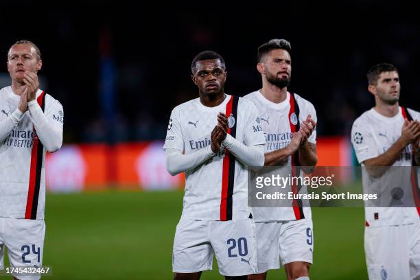 Pierre Kalulu of AC Milan thanks supporters for standing during the UEFA Champions League Group Stage match between Paris Saint-Germain and AC Milan...
