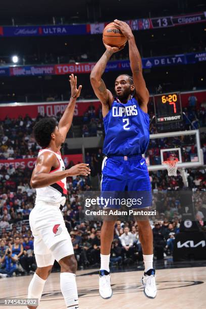 Kawhi Leonard of the LA Clippers shoots a three point basket against the Portland Trail Blazers on October 25, 2023 at Crypto.Com Arena in Los...