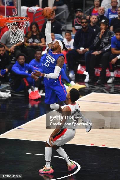 Los Angeles Clippers forward Robert Covington goes up for a dunk during a NBA game between the Denver Nuggets and the Portland Trail Blazers on...