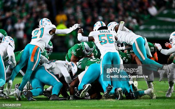 Philadelphia Eagles Quarterback Jalen Hurts performs a QB sneak in the first half during the game between the Miami Dolphins and Philadelphia Eagles...