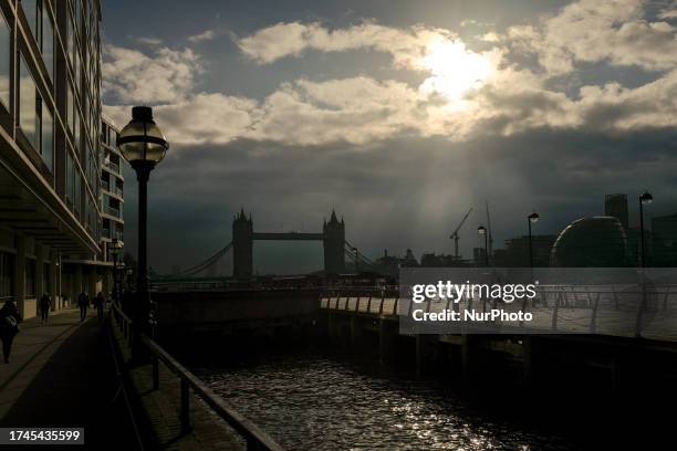The Tower Bridge is seen from the foot path on the north bank of the river Thames, London, England on October 25, 2023.