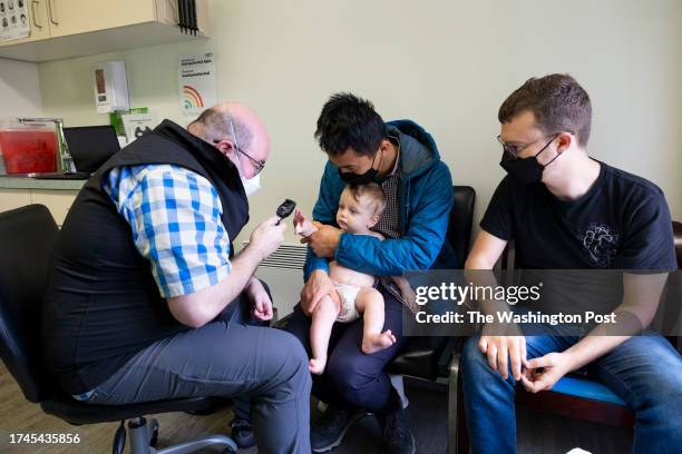 Pediatric primary care provider Elias Kass examines Liam Frank-Dang, 9 months, during an appointment at Intergalactic Pediatrics in Seattle,...