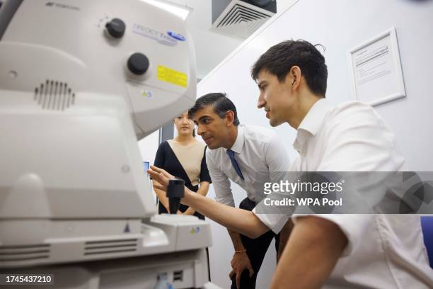 Prime minister Rishi Sunak is shown a Retinal Scan procedure being performed by Dr. Siegfried Wagner, senior research fellow and Dr Xiao Liu with...
