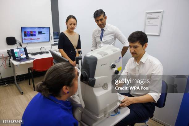 Prime minister Rishi Sunak is shown a Retinal Scan procedure being performed by Dr. Siegfried Wagner, senior research fellow and Dr Xiao Liu with...