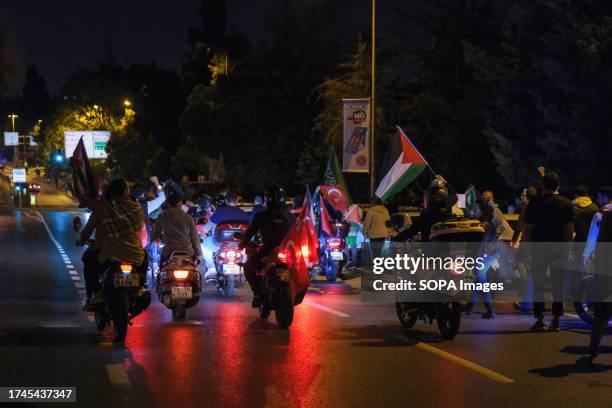 Protesters seen riding bikes during the demonstration. The Mavi Marmara Group assembled in Edirnekap, Istanbul to express their support for the...