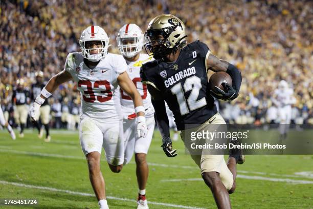 Travis Hunter of the Colorado Buffaloes runs in for a touchdown during a game between Stanford University and University of Colorado at Folsom Field...