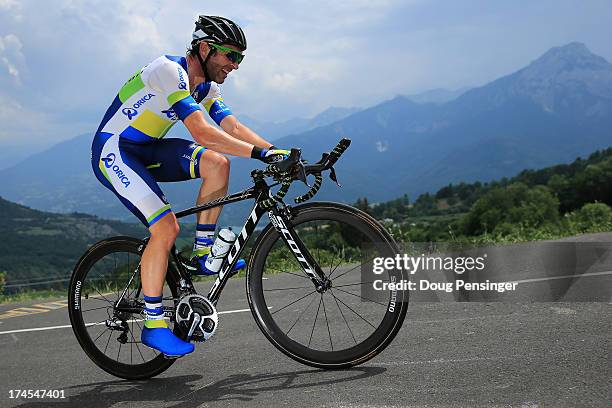 Michael Albasini of Switzerland riding for Orica-GreenEDGE competes during stage seventeen of the 2013 Tour de France, a 32KM Individual Time Trial...