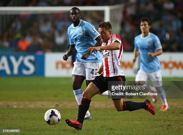 Emanuele Giaccherini of Sutherland runs with the ball during the Barclays Asia Trophy Final match between Manchester City and Sunderland at Hong Kong...