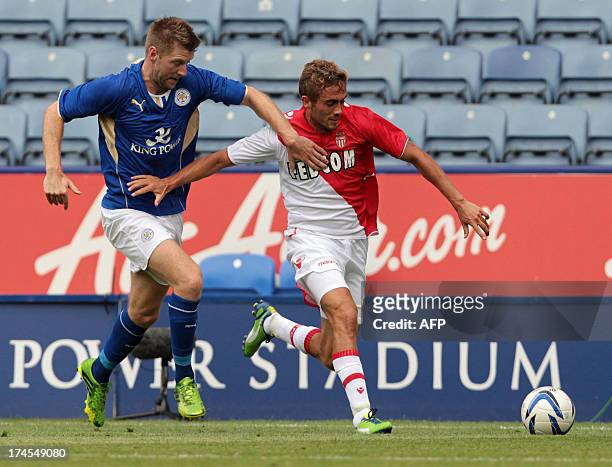 Leicester City's Scottish striker Paul Gallagher vies with AS Monaco's Danish midfielder Jakob Poulsen during the pre-season friendly football match...