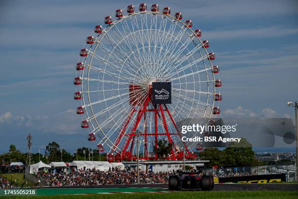 Sergio Perez, Red Bull Racing RB19 during qualifying ahead of the F1 Grand Prix of Japan at Suzuka International Racing Course on September 23, 2023...