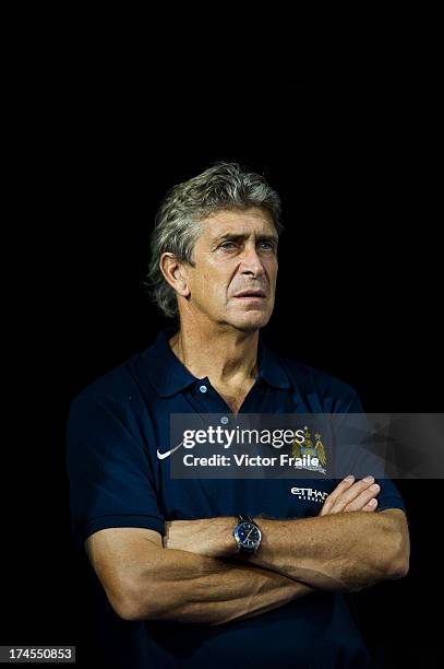 Manager Manuel Pellegrini of Manchester City looks before the Barclays Asia Trophy Final match between Manchester City and Sunderland at Hong Kong...