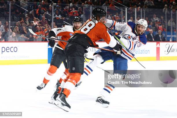 Marc Staal of the Philadelphia Flyers collides with Leon Draisaitl of the Edmonton Oilers during the first period at the Wells Fargo Center on...