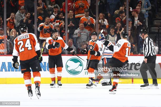 Joel Farabee of the Philadelphia Flyers celebrates with teammates after scoring during the first period against the Edmonton Oilers at the Wells...