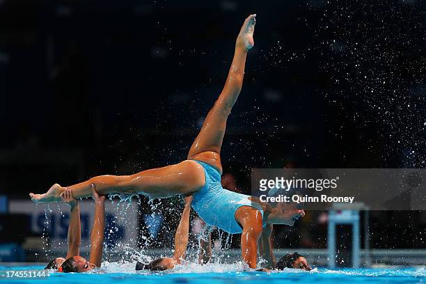 Italy compete during the Synchronized Swimming Free Combination Final on day eight of the 15th FINA World Championships at Palau Sant Jordi on July...