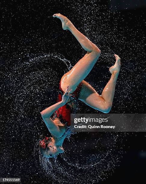 Russia compete during the Synchronized Swimming Free Combination Final on day eight of the 15th FINA World Championships at Palau Sant Jordi on July...