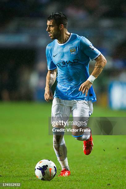 Alvaro Negredo of Manchester City runs with the ball during the Barclays Asia Trophy Final match between Manchester City and Sunderland at Hong Kong...