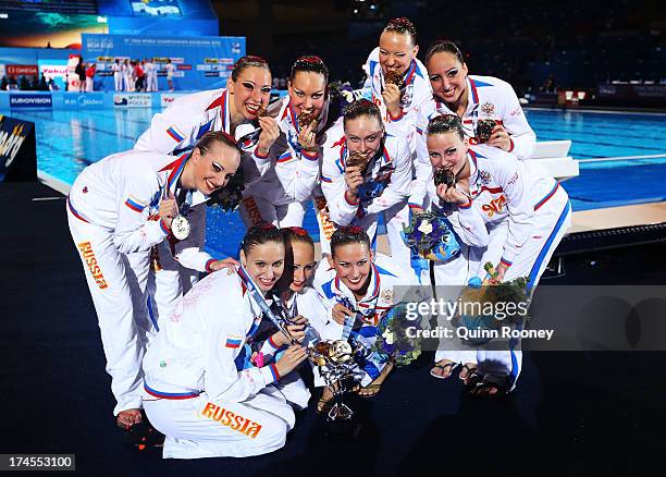 Gold medal winners Russia celebrate after winning the Synchronized Swimming Free Combination Final on day eight of the 15th FINA World Championships...