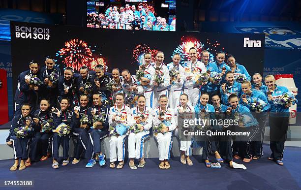 Silver medal winners Spain, Gold medal winners Russia and Bronze medal winners Ukraine celebrate after during the Synchronized Swimming Free...