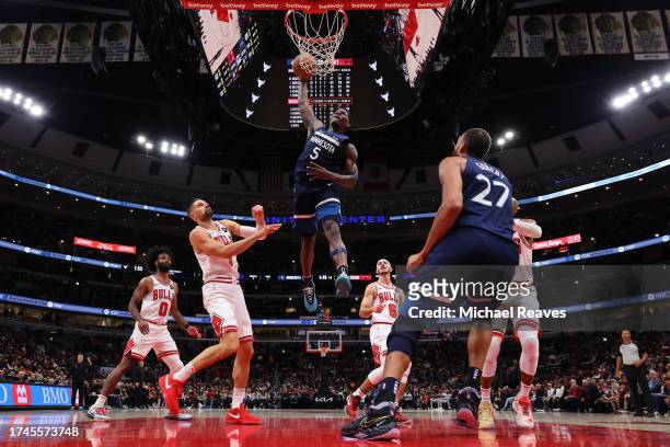 Anthony Edwards of the Minnesota Timberwolves dunks against the Chicago Bulls during the first half of a preseason game at the United Center on...