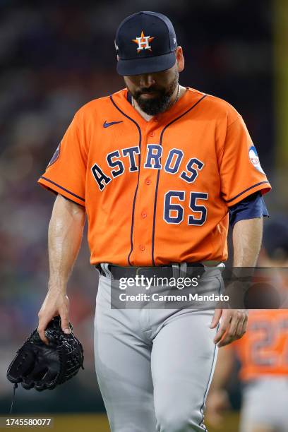 José Urquidy of the Houston Astros walks off the field after being relieved in the third inning against the Texas Rangers during Game Four of the...