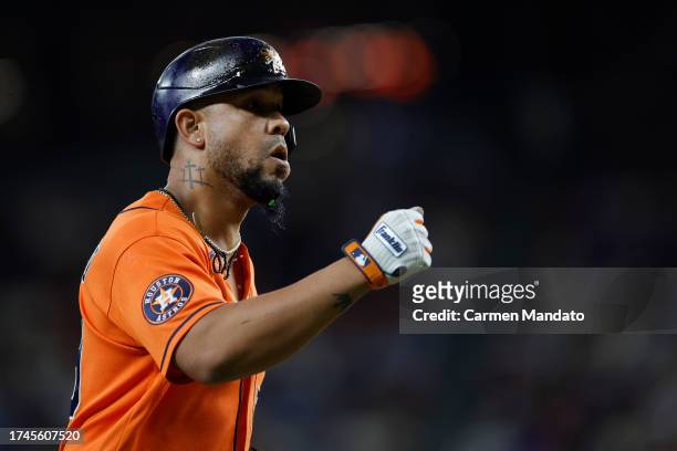 José Abreu of the Houston Astros rounds the bases after hitting a home run in the fourth inning against the Texas Rangers during Game Four of the...