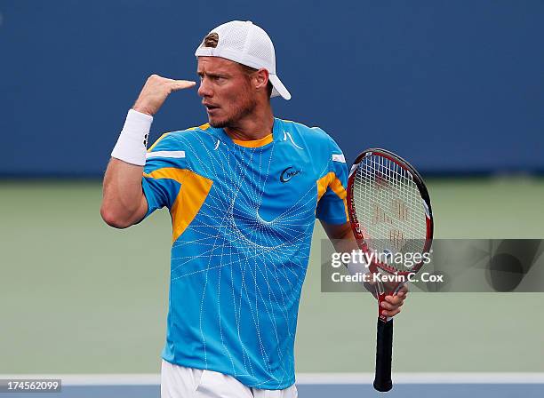 Lleyton Hewitt of Australia reacts after winning a point against John Isner during the BB&T Atlanta Open in Atlantic Station on July 27, 2013 in...