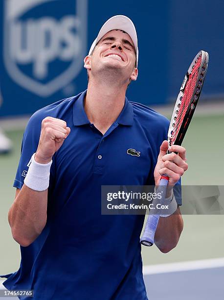 John Isner reacts after defeaing Lleyton Hewitt of Australia during the BB&T Atlanta Open in Atlantic Station on July 27, 2013 in Atlanta, Georgia.