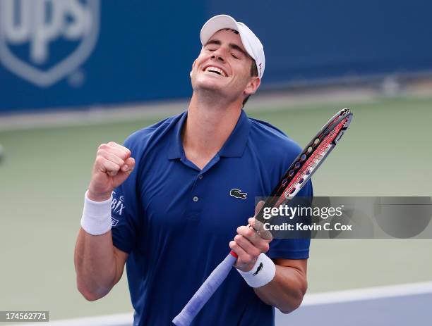 John Isner reacts after defeaing Lleyton Hewitt of Australia during the BB&T Atlanta Open in Atlantic Station on July 27, 2013 in Atlanta, Georgia.