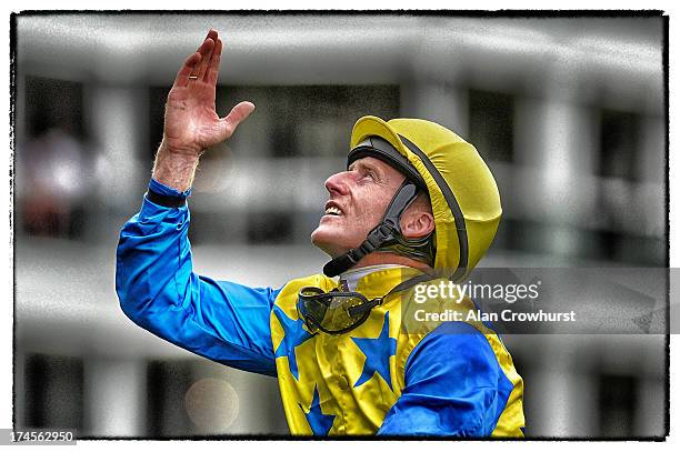 Johnny Murtagh celebrates after riding Novellist to win The King George VI and Queen Elizabeth Stakes at Ascot racecourse on July 27, 2013 in Ascot,...