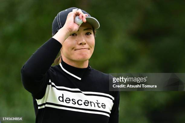 Ayaka Watanabe of Japan acknowledges the gallery after the birdie on the 1st green during the second round of NOBUTA Group Masters GC Ladies at...