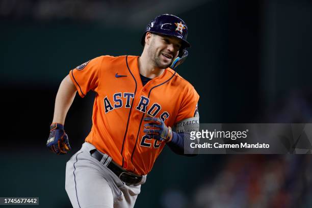Chas McCormick of the Houston Astros rounds the bases after hitting a home run in the seventh inning against the Texas Rangers during Game Four of...