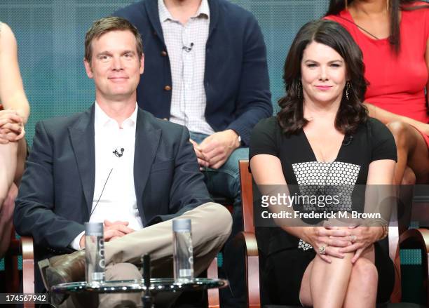 Actors Peter Krause and Lauren Graham speak onstage during the "Parenthood" panel discussion at the NBC portion of the 2013 Summer Television Critics...