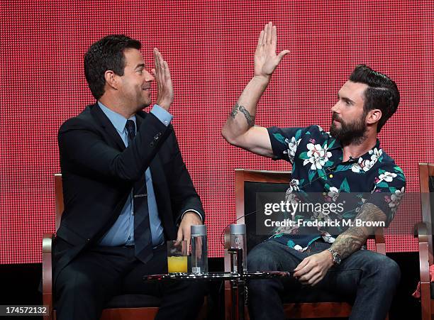 Producer/Host Carson Daly and coach Adam Levine speak onstage during "The Voice" panel discussion at the NBC portion of the 2013 Summer Television...