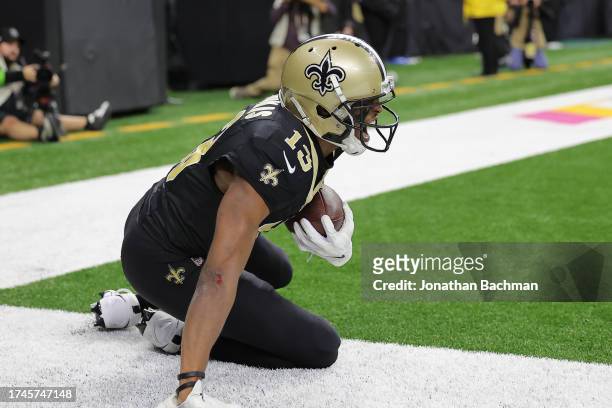 Michael Thomas of the New Orleans Saints celebrates after catching a 17-yard touchdown pass against Montaric Brown of the Jacksonville Jaguars during...