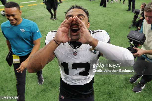 Christian Kirk of the Jacksonville Jaguars celebrates as he leaves the field after defeating the New Orleans Saints 31-24 at Caesars Superdome on...