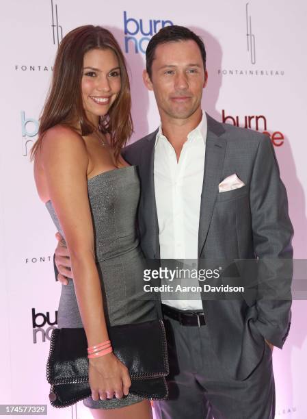 Jeffrey Donovan and Michelle Woods arrive at wrap party for "Burn Notice" at Fontainebleau Miami Beach on July 27, 2013 in Miami Beach, Florida.