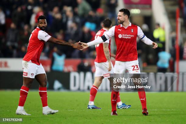 Cafu and Sean Morrison of Rotherham United celebrate after teammate Lee Peltier scores their side's first goal during the Sky Bet Championship match...