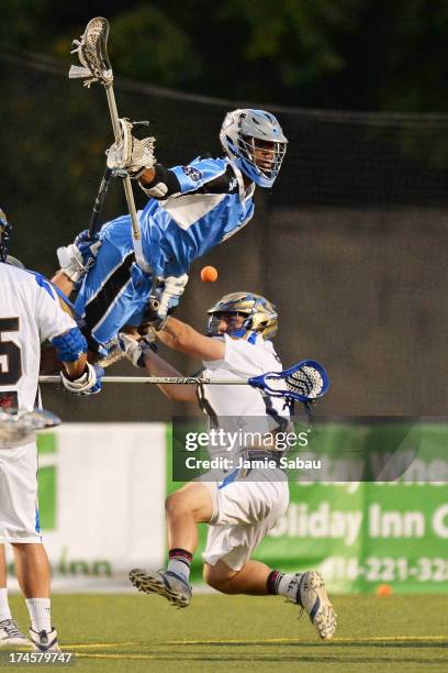 Chazz Woodson of the Ohio Machine attempts to score over goalie Adam Ghitelman of the Charlotte Hounds in the fourth period on July 27, 2013 at Selby...