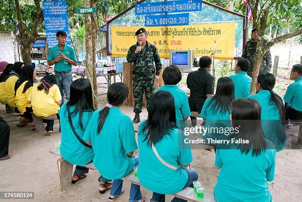 Lt. Col. Chalermpon from the Royal Thai Army teaches self-sufficient economy to a community of Muslim villagers. The project is part of an effort led...