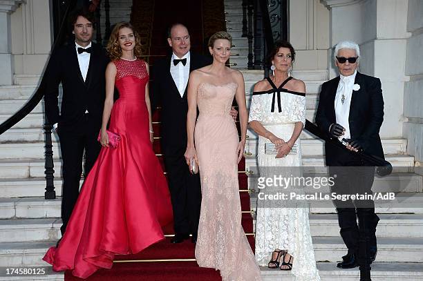 Antoine Arnault, Natalia Vodianova, Prince Albert II of Monaco, Princess Charlene of Monaco, Princess Caroline of Hanover and Karl Lagerfeld arrive...