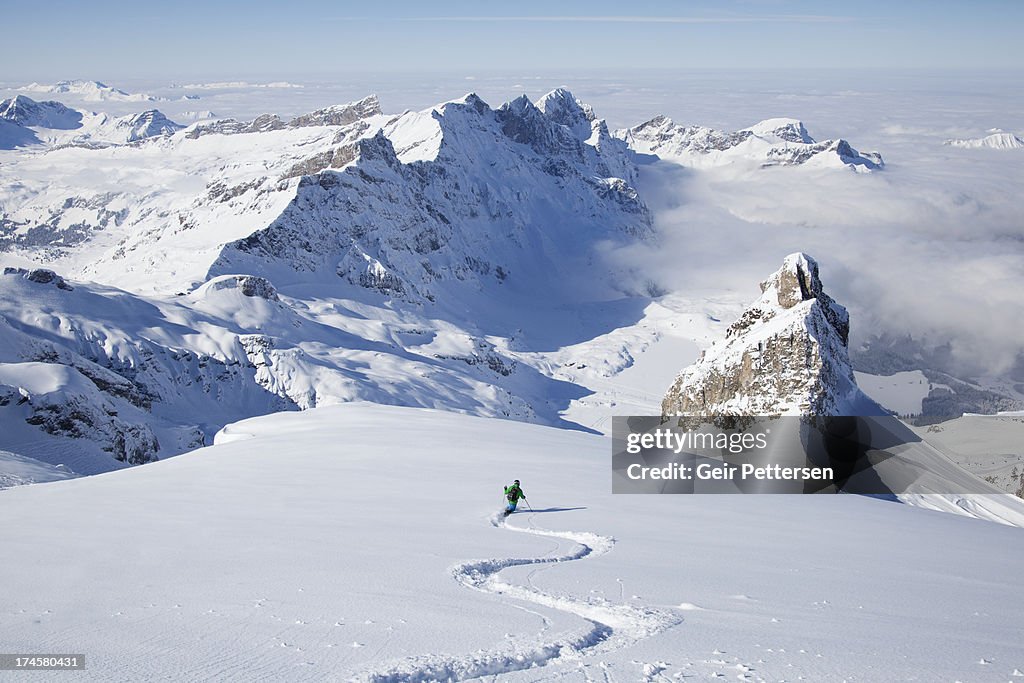 Off-piste skier in powder snow