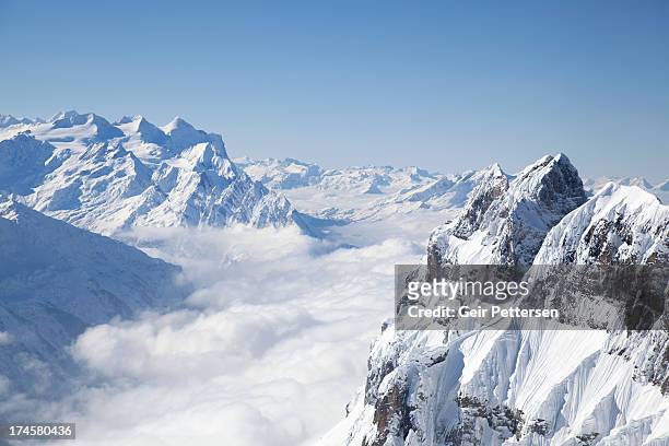 mountain landscape in winter - schweizer alpen stock-fotos und bilder